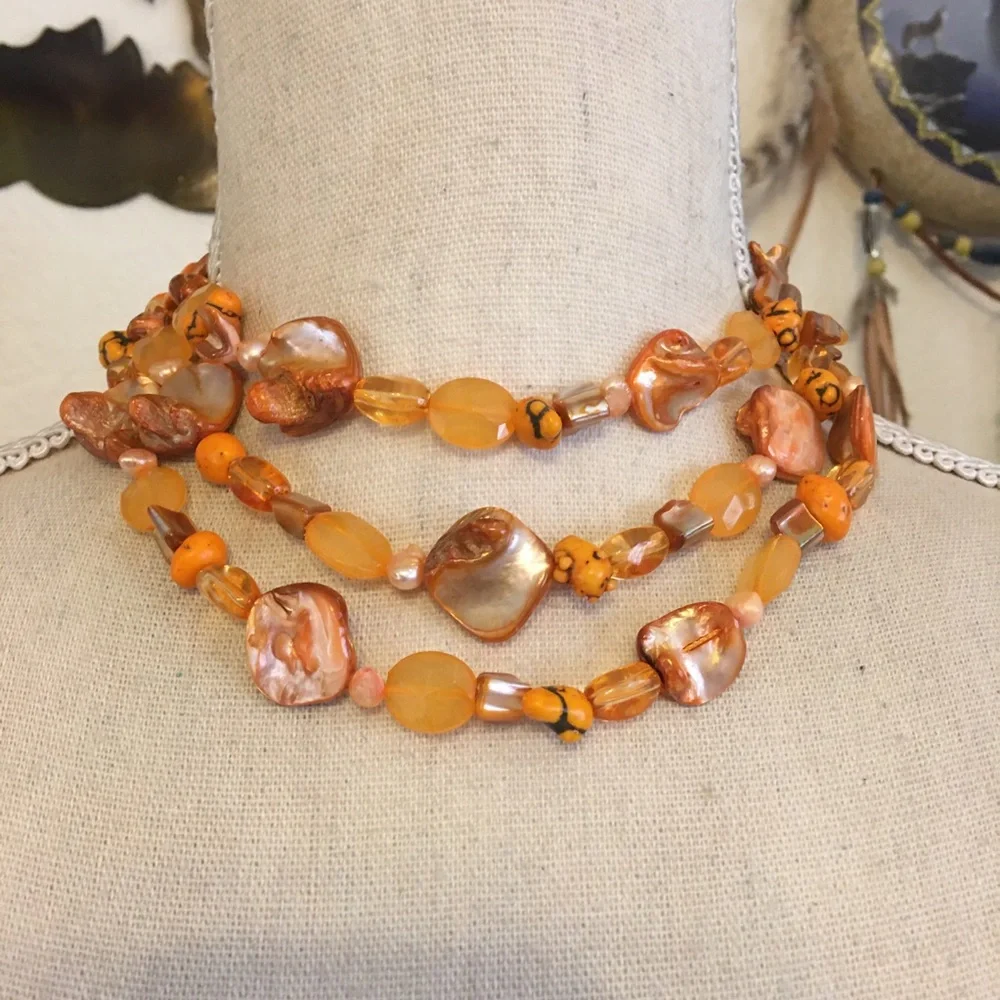 Triple strand orange tone shell & bead choker